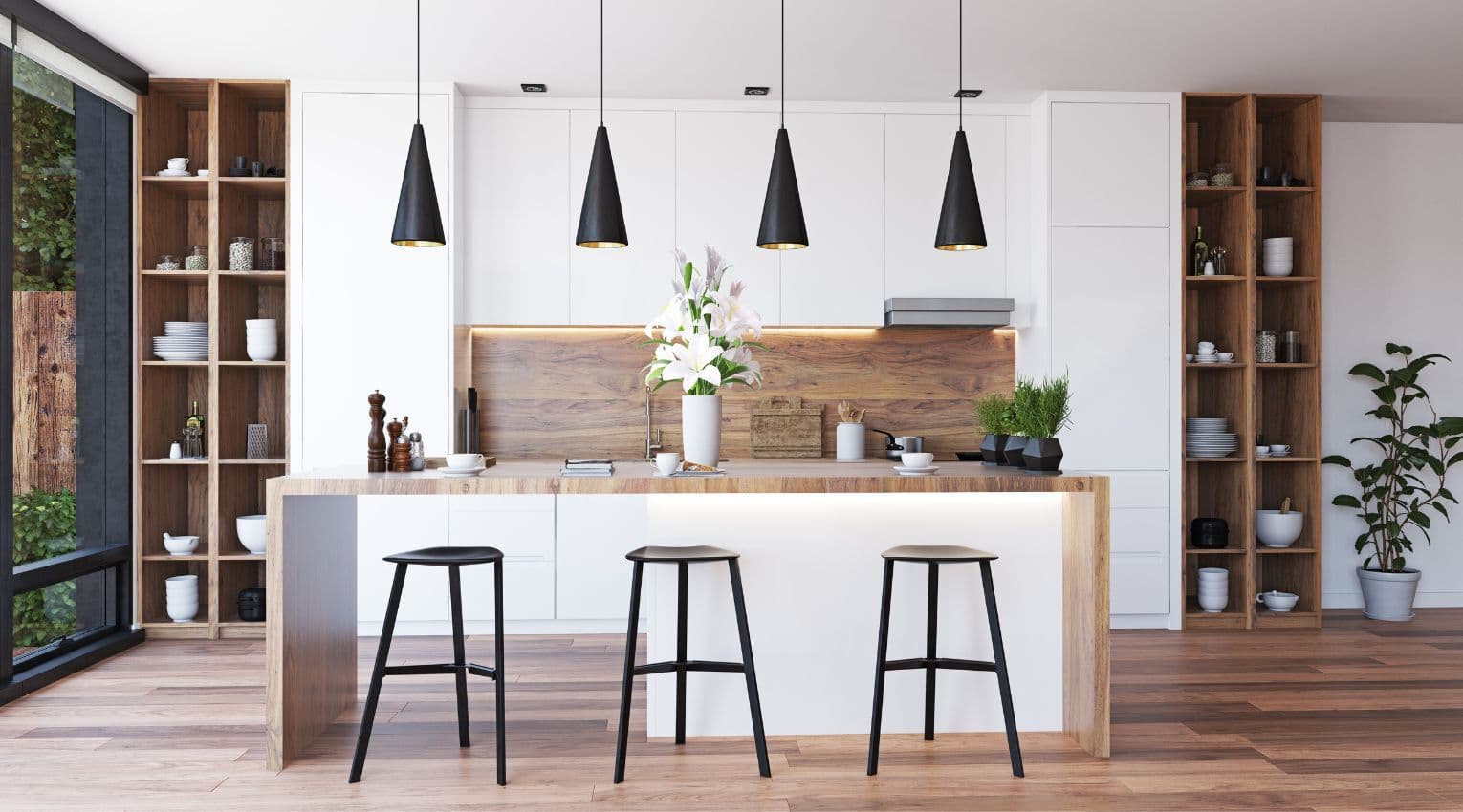 modern kitchen with wood island and white walls